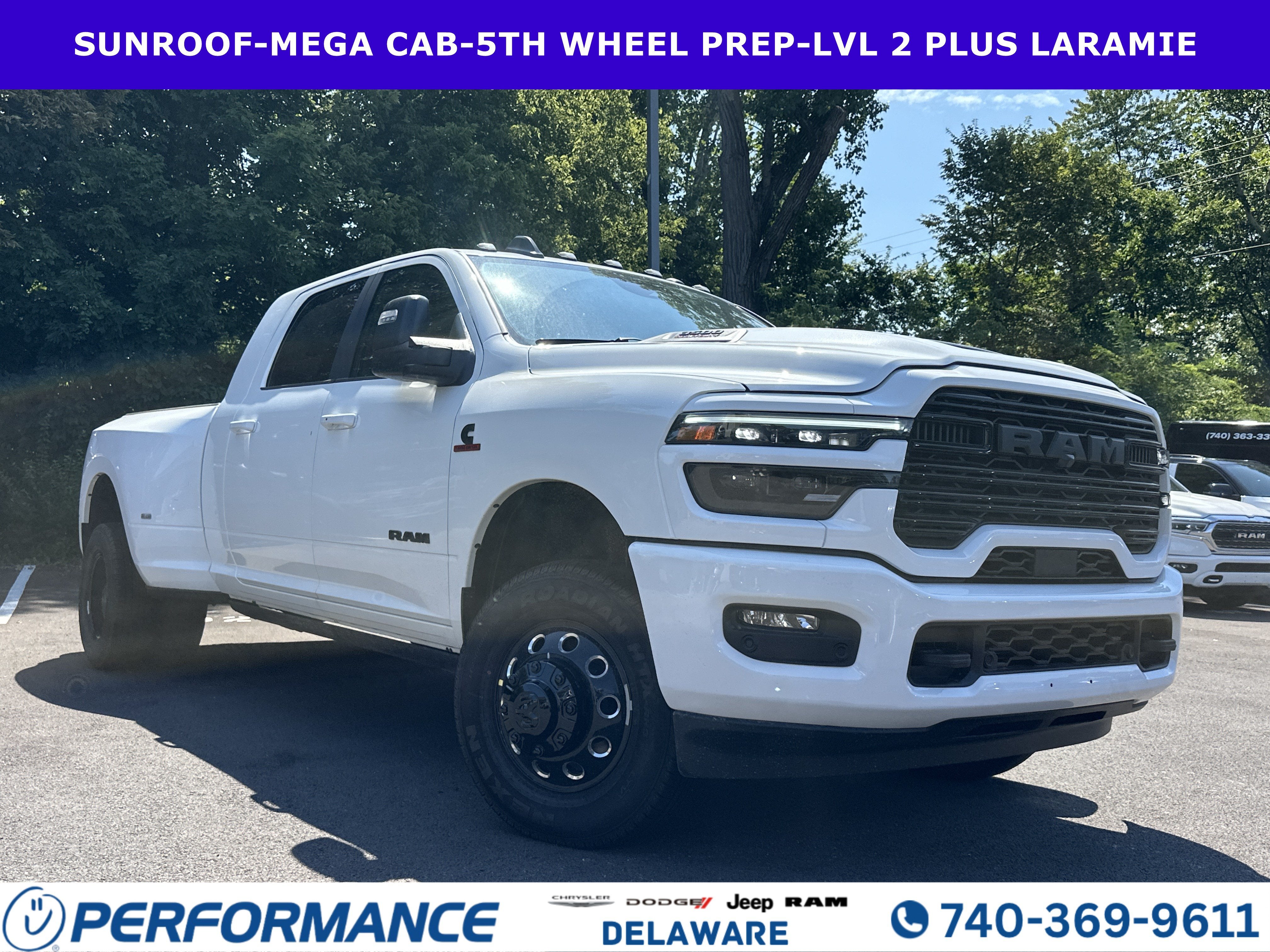 2026 RAM 3500 Laramie in Bright White Clearcoat — front three-quarter view