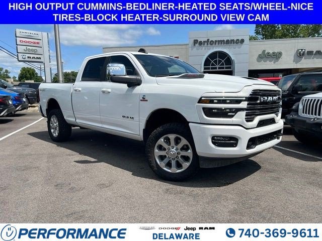 2025 RAM 2500 Laramie in Bright White Clearcoat — front three-quarter view