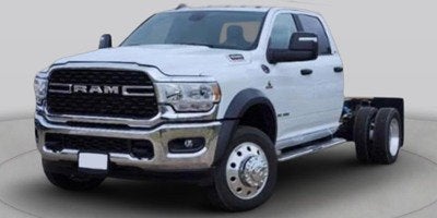 2026 RAM 5500HD Tradesman in Molten Red Pearlcoat — front three-quarter view