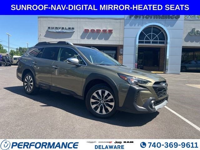 2025 Subaru Outback Touring XT in Autumn Green Metallic — front three-quarter view