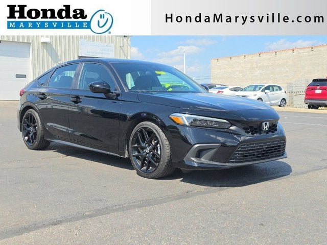 2024 Honda Civic Hatchback Sport in Crystal Black Pearl — front three-quarter view