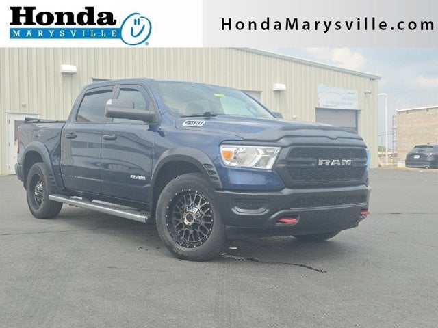 2019 RAM 1500 Tradesman in Patriot Blue Pearlcoat — front three-quarter view