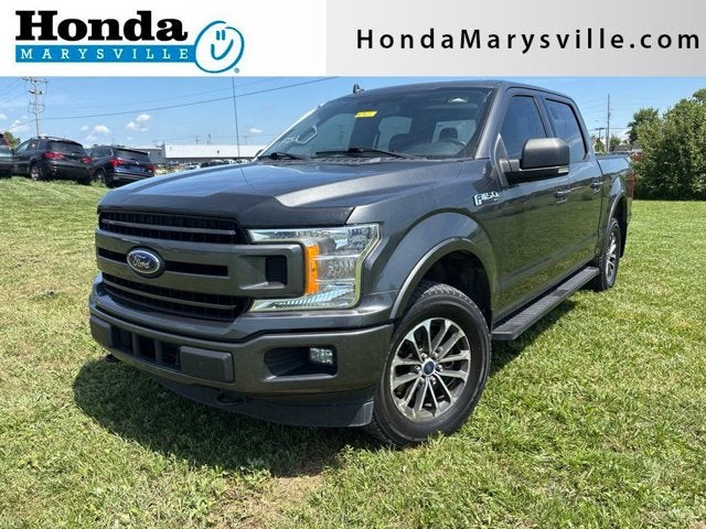 2018 Ford F-150 XLT in Magnetic Metallic — front three-quarter view