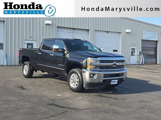 2015 Chevrolet Silverado 2500HD LTZ in Black — front three-quarter view