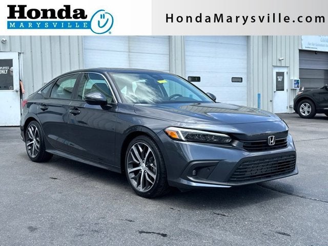 2023 Honda Civic Touring in Meteorite Gray Metallic — front three-quarter view
