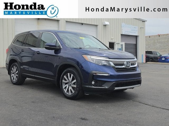2019 Honda Pilot EX-L in Obsidian Blue Pearl — front three-quarter view