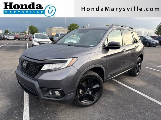 2021 Honda Passport Elite in Modern Steel Metallic — front three-quarter view
