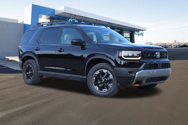 2026 Honda Passport TrailSport Elite AWD in Crystal Black Pearl — front three-quarter view