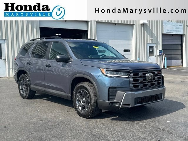 2026 Honda Pilot TrailSport in Smoke Blue Pearl — front three-quarter view