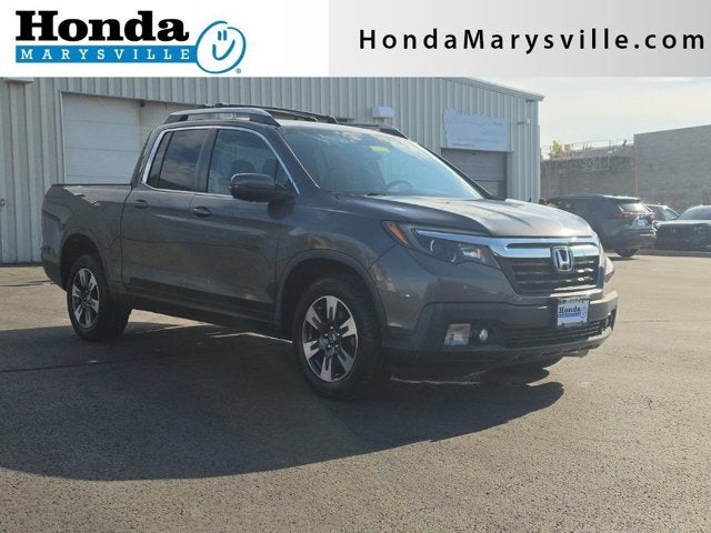 2017 Honda Ridgeline RTL in Modern Steel Metallic — front three-quarter view