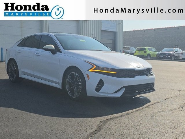 2021 Kia K5 EX in Glacial White Pearl — front three-quarter view