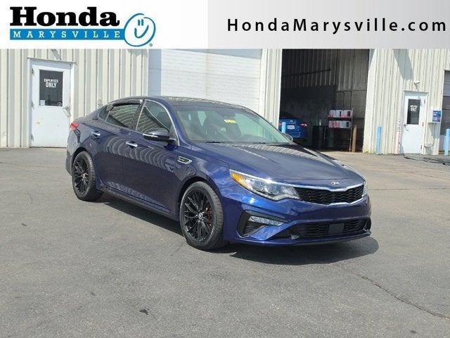 2020 Kia Optima SX in Horizon Blue — front three-quarter view