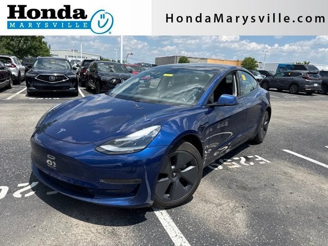 2021 Tesla Model 3 Long Range in Deep Blue Metallic — front three-quarter view