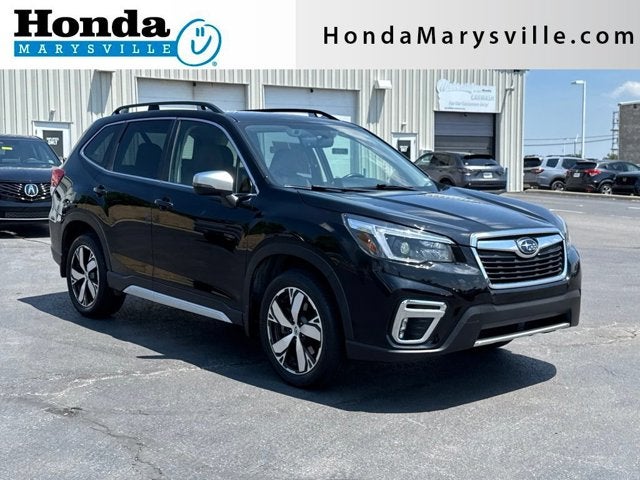 2021 Subaru Forester Touring in Crystal Black Pearl — front three-quarter view