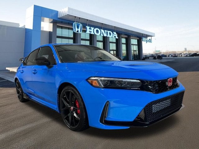 2026 Honda Civic Hatchback Manual in Boost Blue Pearl — front three-quarter view