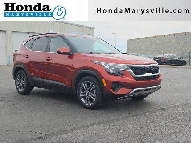 2023 Kia Seltos S in Mars Orange — front three-quarter view