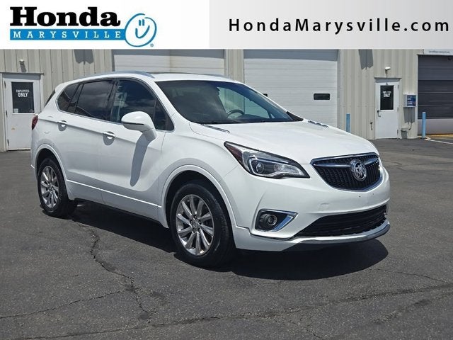 2019 Buick Envision Essence in Summit White — front three-quarter view