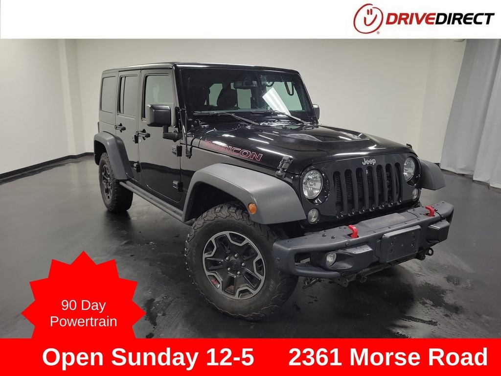 2016 Jeep Wrangler Unlimited Rubicon in Black Clearcoat — front three-quarter view