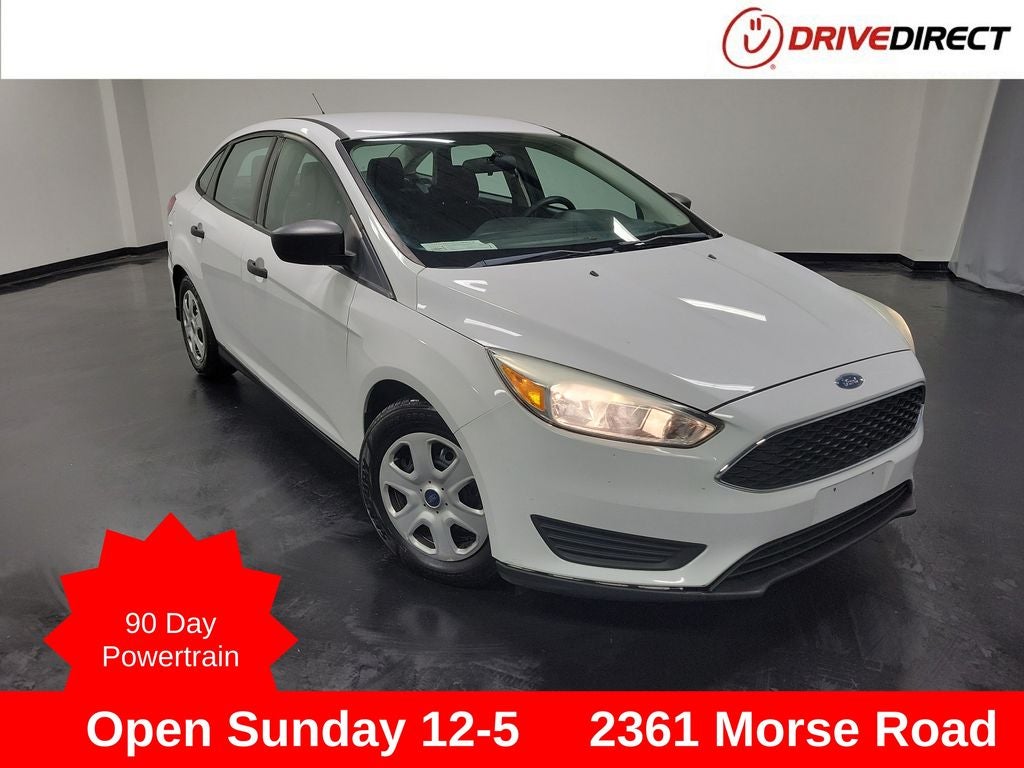 2015 Ford Focus S in Oxford White — front three-quarter view