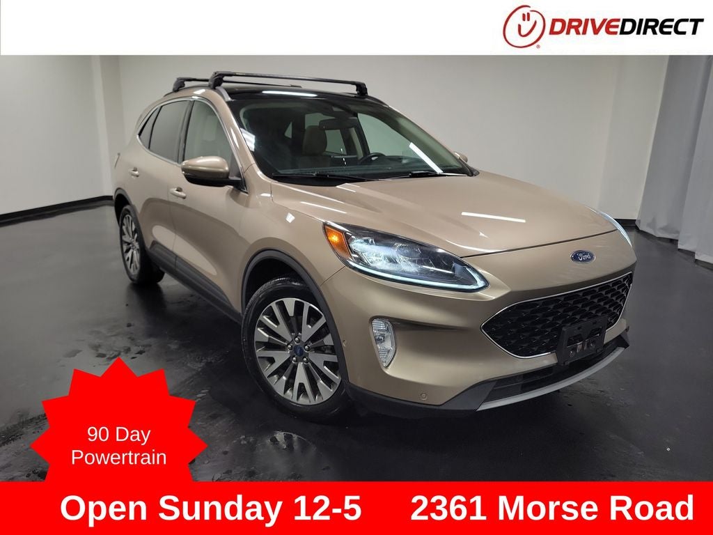 2020 Ford Escape Hybrid Titanium in Desert Gold Metallic — front three-quarter view