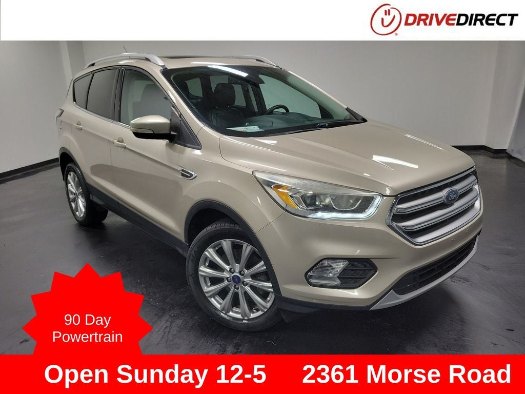 2017 Ford Escape Titanium in White Gold Metallic — front three-quarter view