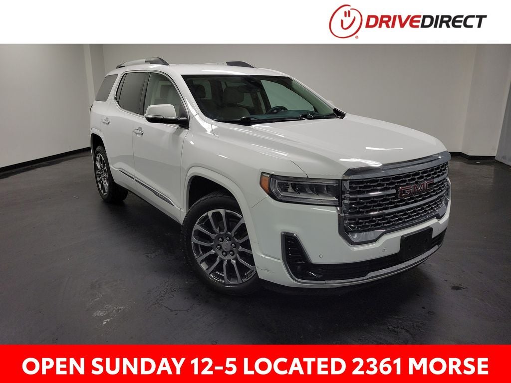 2023 GMC Acadia Denali in Summit White — front three-quarter view