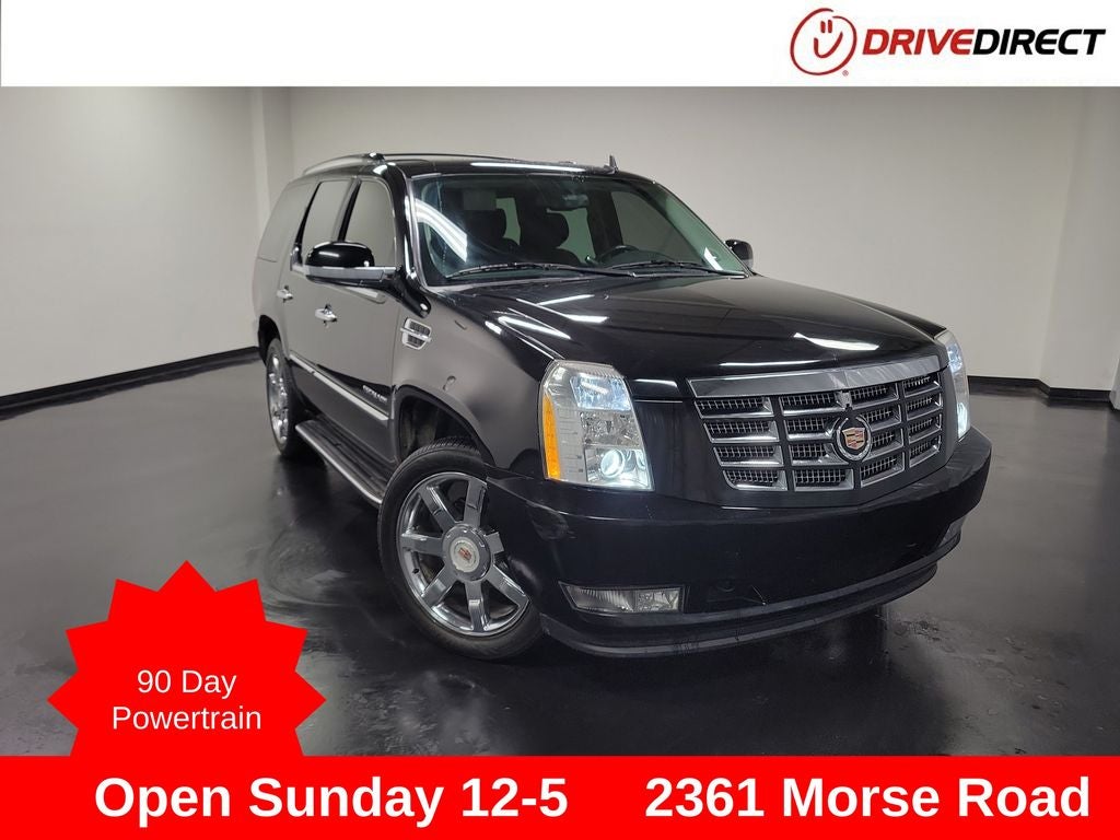 2014 Cadillac Escalade Luxury in Black Raven — front three-quarter view
