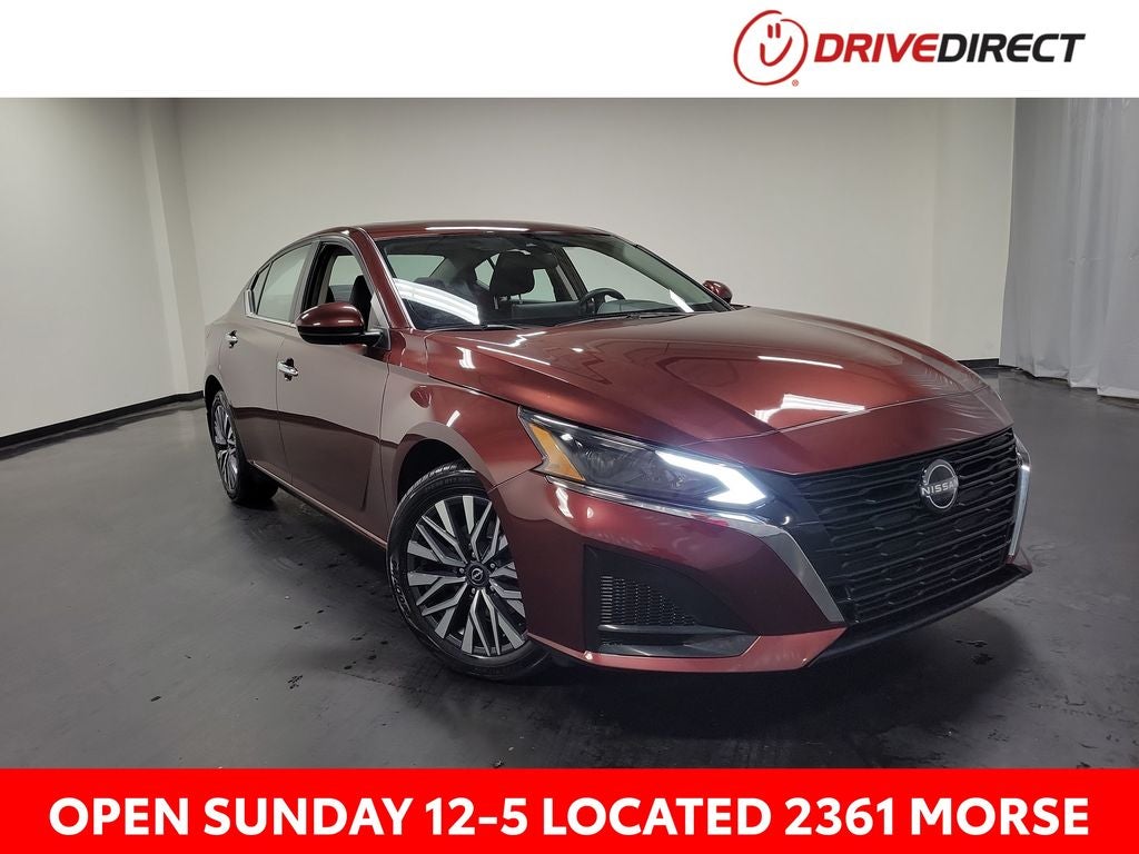 2023 Nissan Altima 2.5 SV in Garnet Pearl Metallic — front three-quarter view