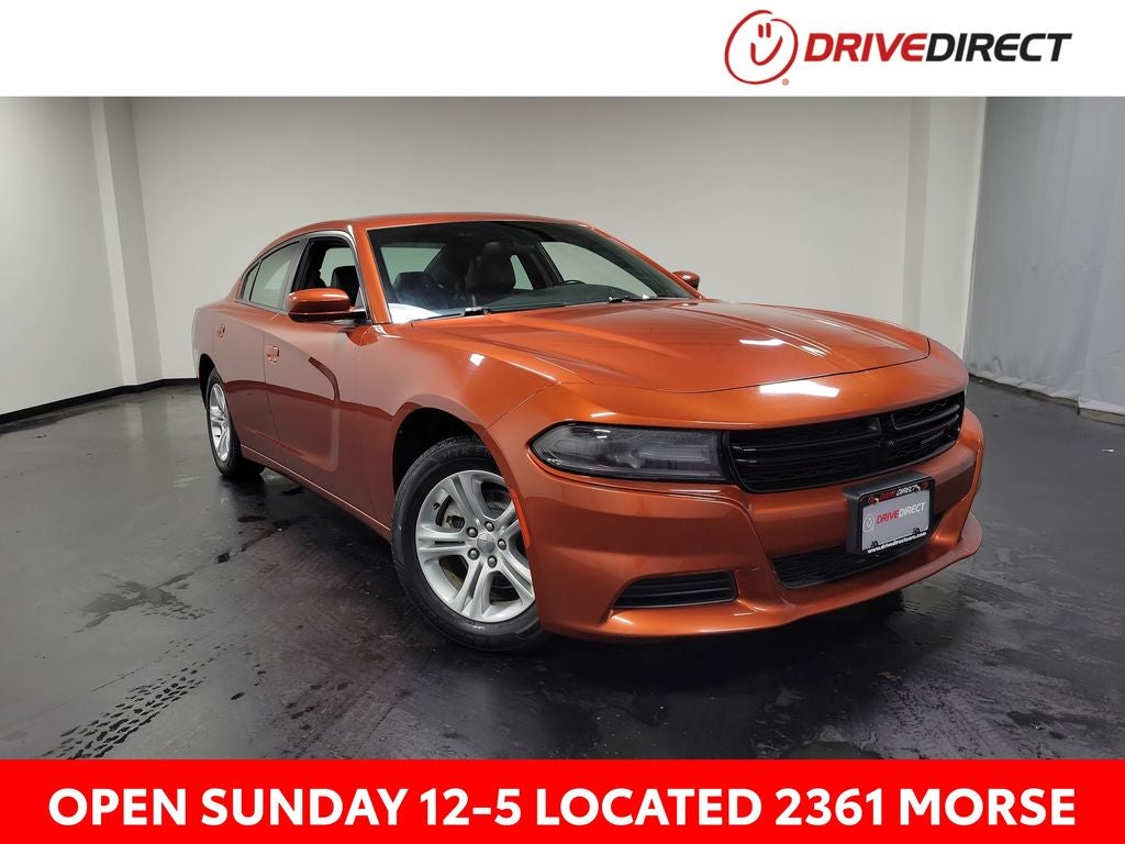 2021 Dodge Charger SXT in Sinamon Stick — front three-quarter view