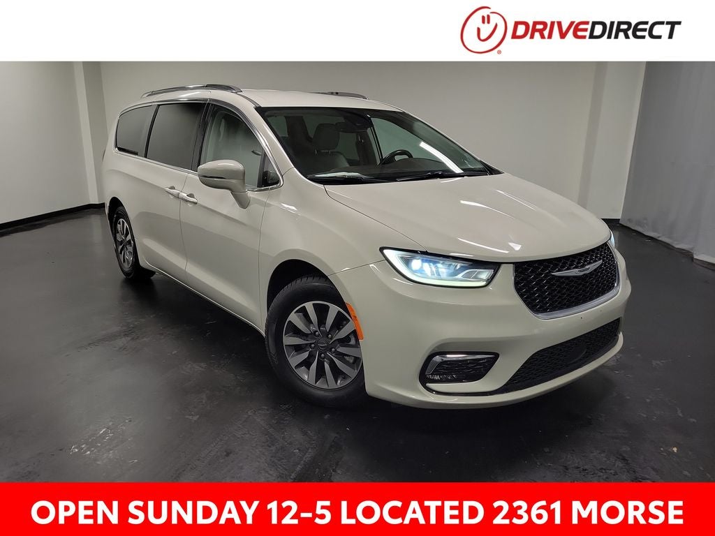 2021 Chrysler Pacifica Touring L in Luxury White Pearlcoat — front three-quarter view