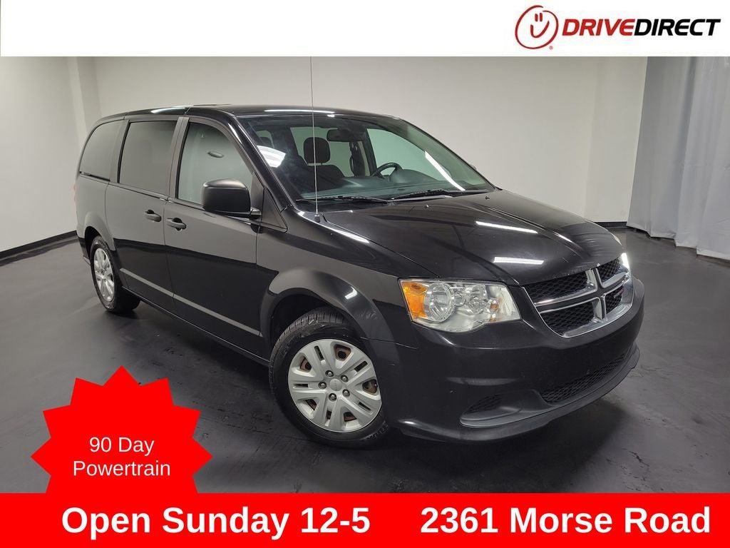 2019 Dodge Grand Caravan SE in Brilliant Black Crystal Pearlcoat — front three-quarter view