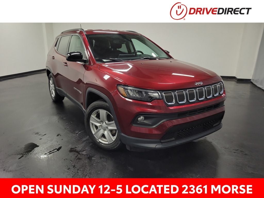 2022 Jeep Compass Latitude in Velvet Red Pearlcoat — front three-quarter view