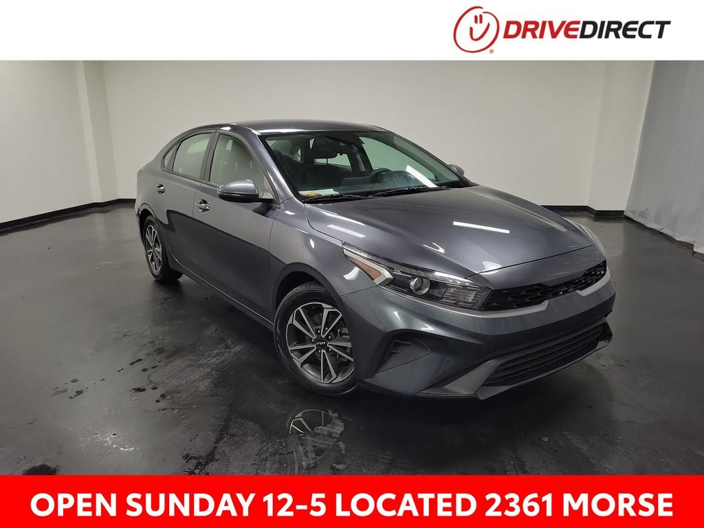 2024 Kia Forte LXS in Gravity Gray — front three-quarter view