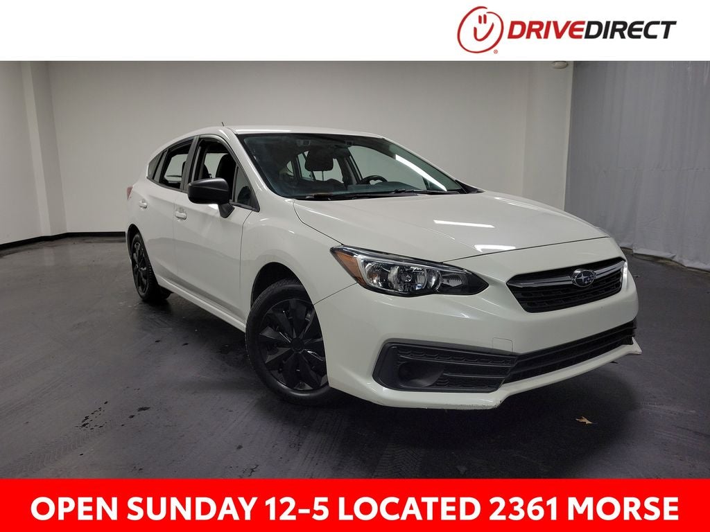 2022 Subaru Impreza Base in Crystal White Pearl — front three-quarter view