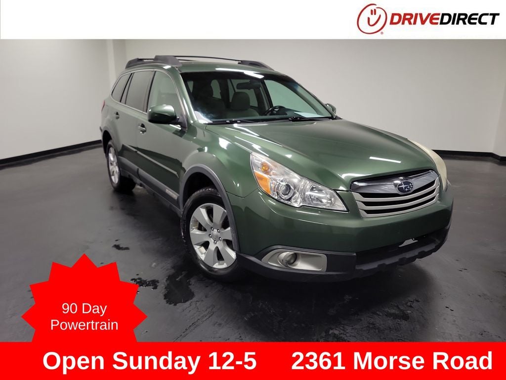 2012 Subaru Outback 2.5i Premium in Cypress Green Pearl — front three-quarter view