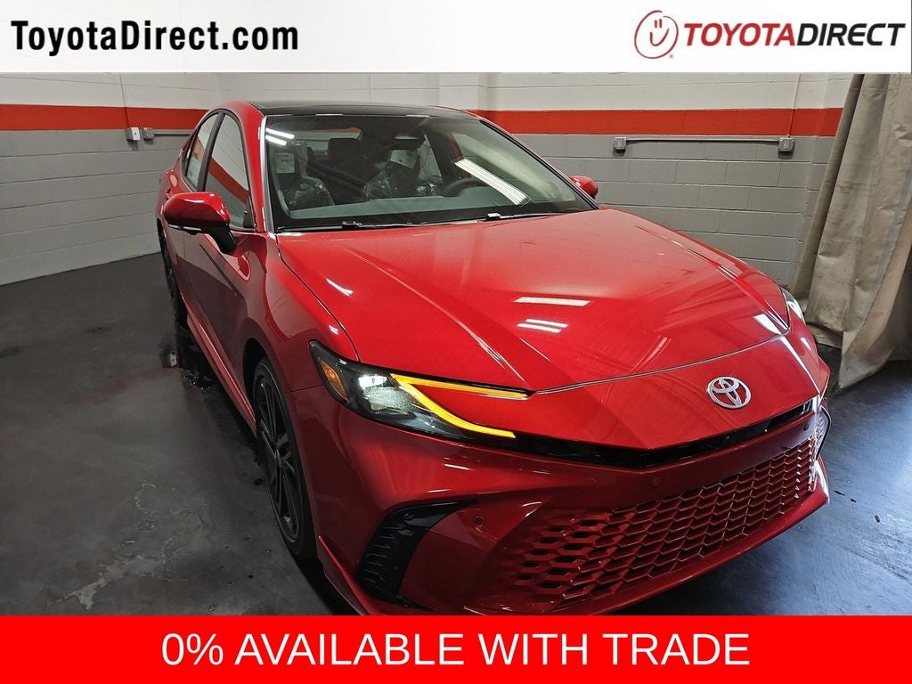 2026 Toyota Camry XSE in Supersonic Red — front three-quarter view