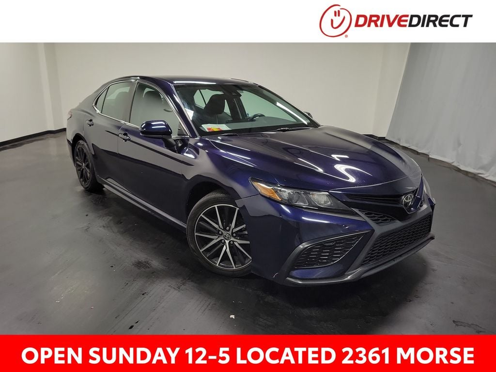 2021 Toyota Camry SE in Blueprint — front three-quarter view