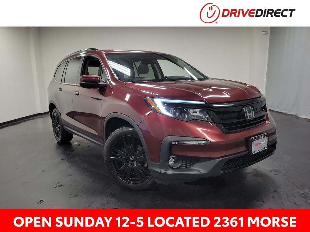 2022 Honda Pilot Special Edition in Deep Scarlet Pearl — front three-quarter view