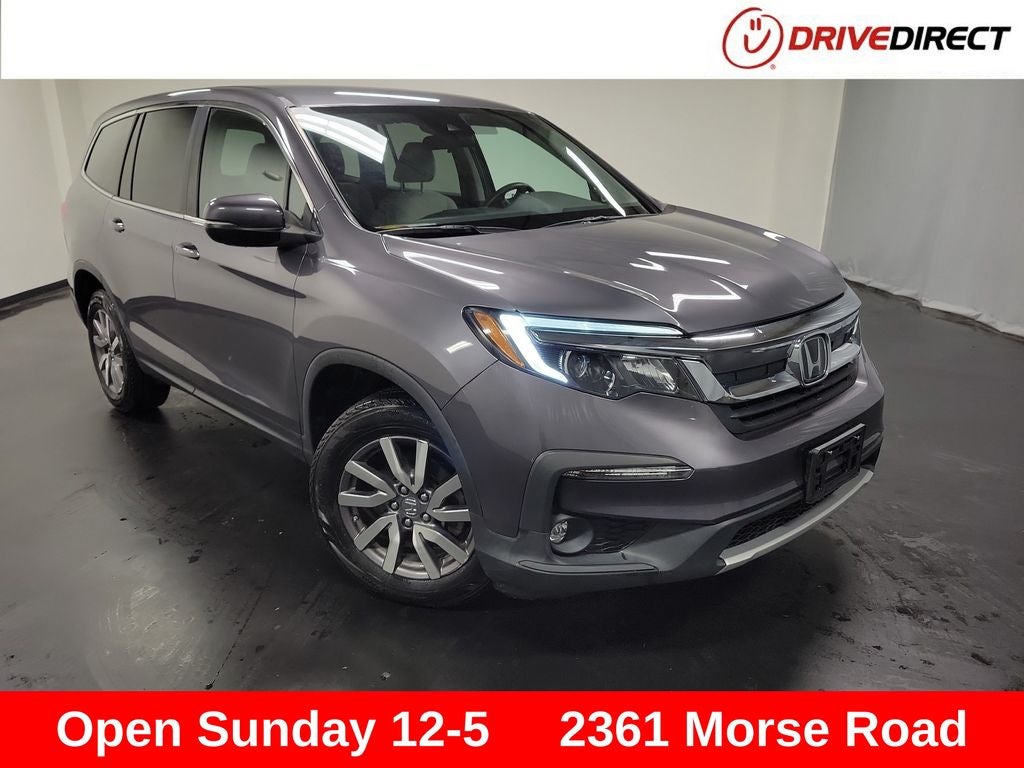 2020 Honda Pilot EX in Modern Steel Metallic — front three-quarter view
