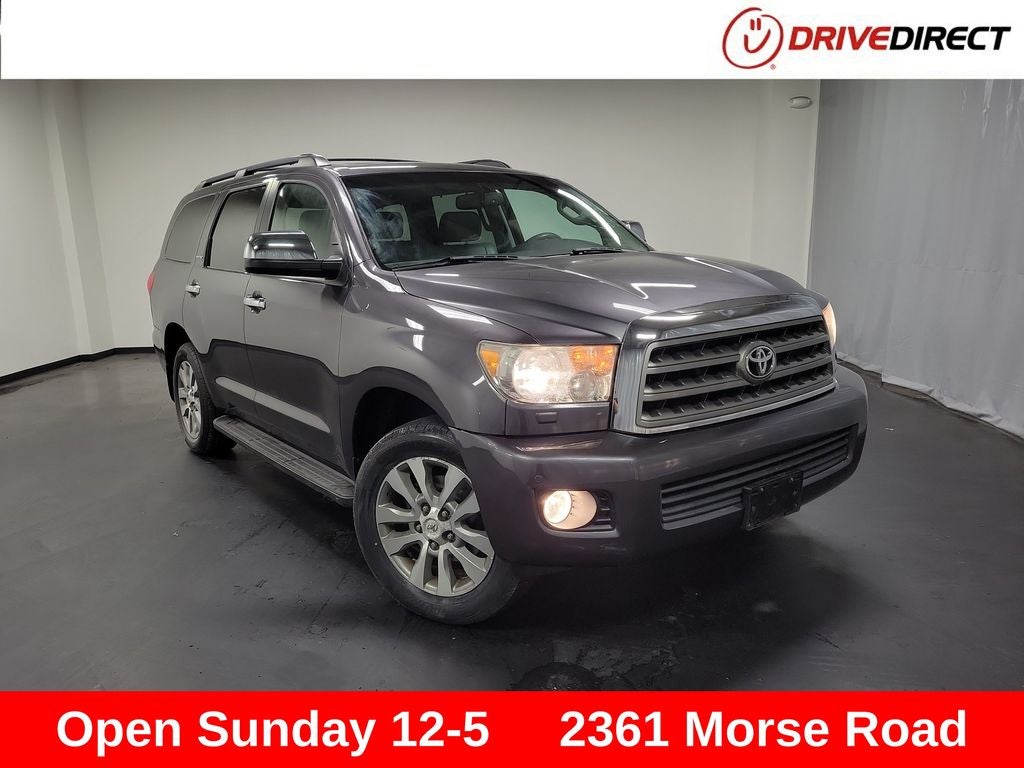 2014 Toyota Sequoia Limited in Magnetic Gray Metallic — front three-quarter view