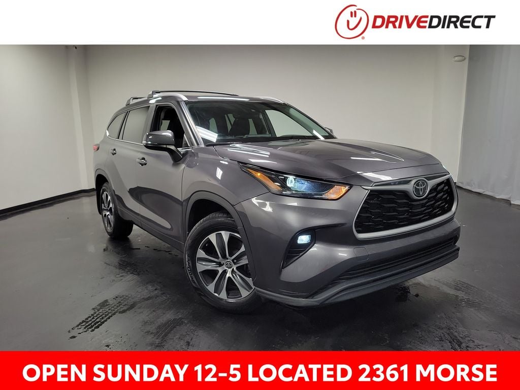 2023 Toyota Highlander XLE in Magnetic Gray Metallic — front three-quarter view