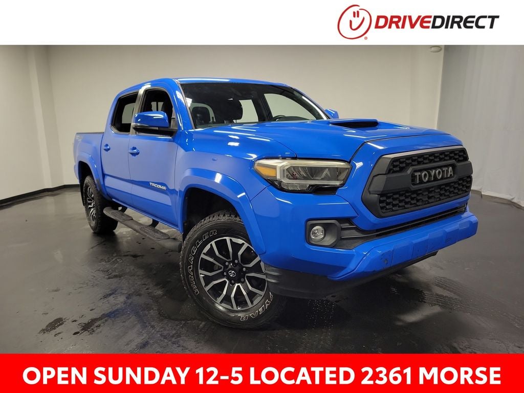 2020 Toyota Tacoma TRD Sport V6 in Voodoo Blue — front three-quarter view
