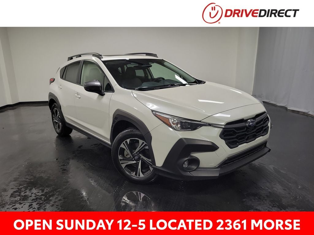 2024 Subaru Crosstrek Premium in Crystal White Pearl — front three-quarter view