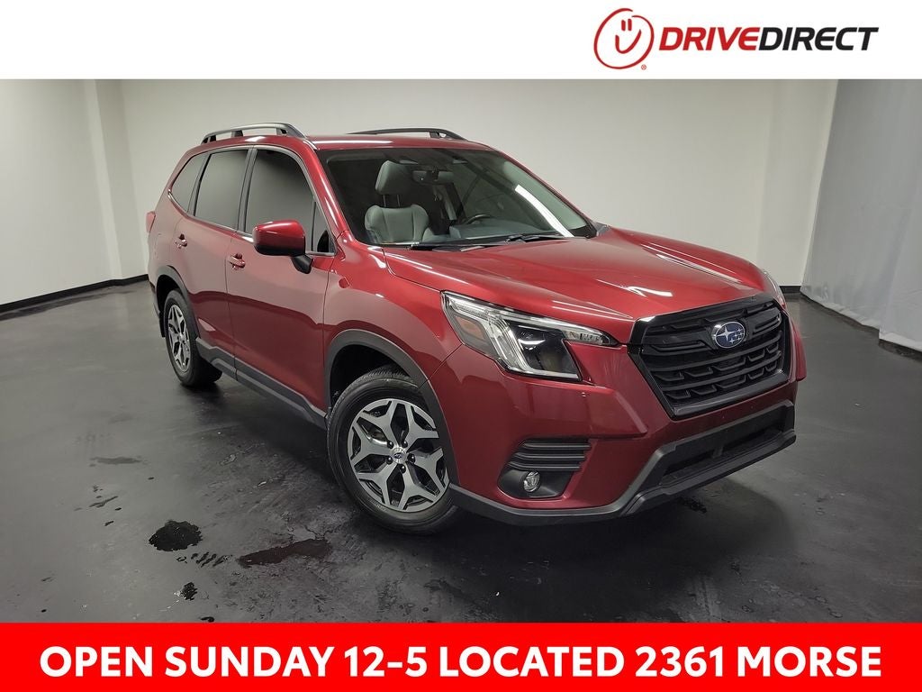 2024 Subaru Forester Premium in Crimson Red Pearl — front three-quarter view