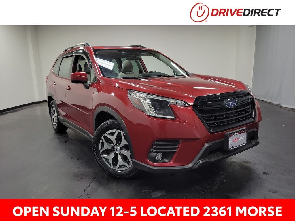 2024 Subaru Forester Premium in Crimson Red Pearl — front three-quarter view