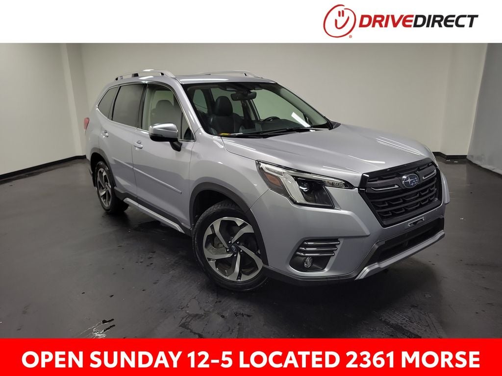 2024 Subaru Forester Touring in Ice Silver Metallic — front three-quarter view