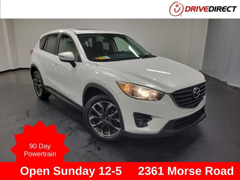 2016 Mazda Mazda CX-5 Grand Touring in Crystal White Pearl Mica — front three-quarter view