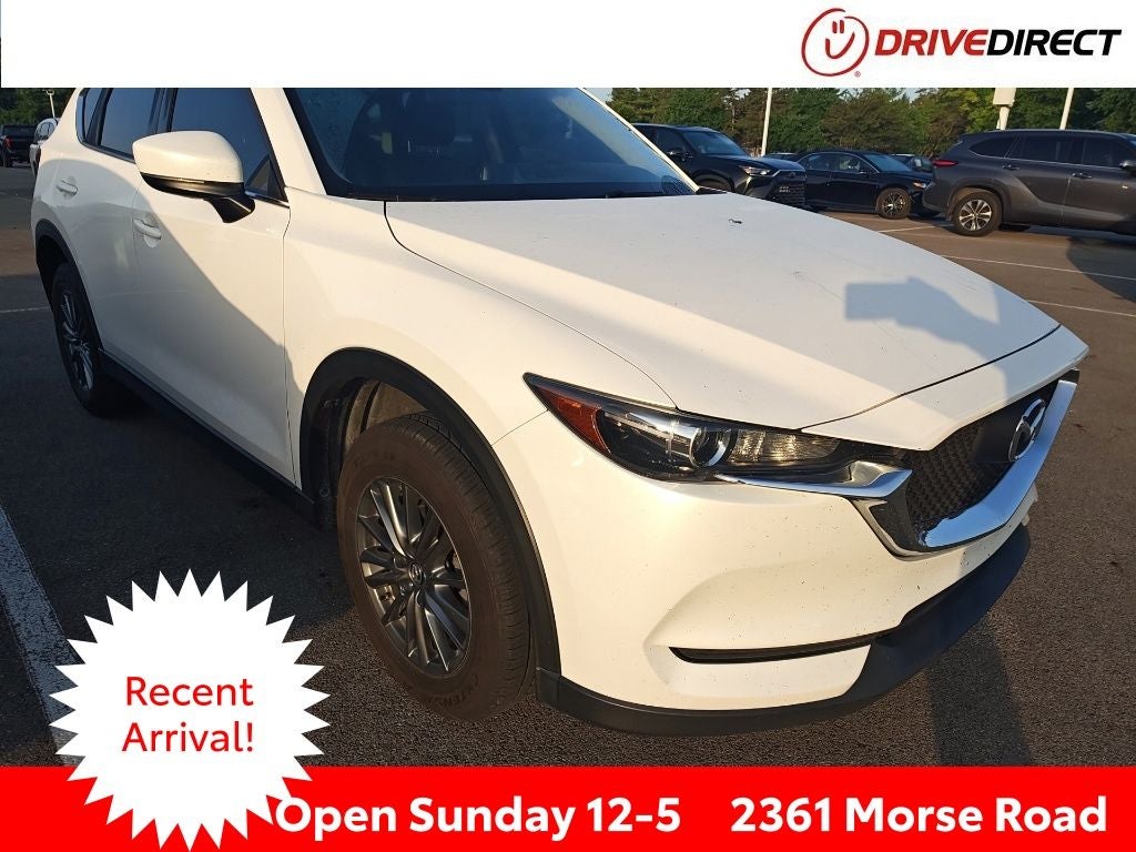 2017 Mazda Mazda CX-5 Sport in Snowflake White Pearl Mica — front three-quarter view