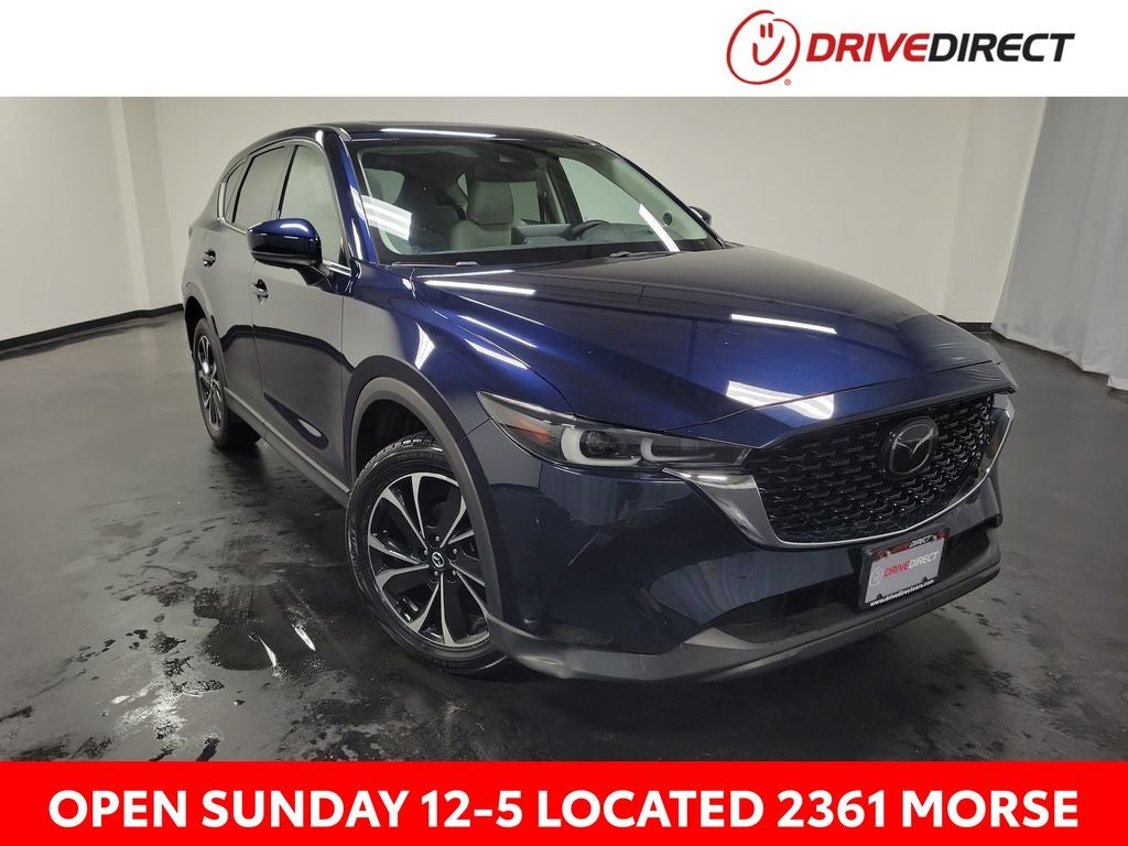 2023 Mazda Mazda CX-5 2.5 S Premium Plus Package in Deep Crystal Blue Mica — front three-quarter view