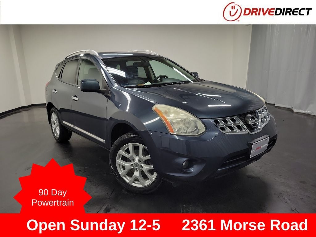 2013 Nissan Rogue SL in Graphite Blue Metallic — front three-quarter view